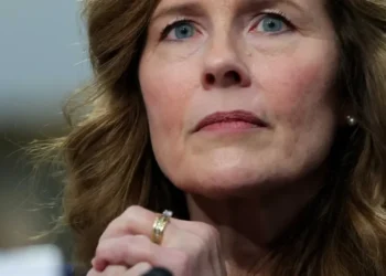Amy Coney Barrett deflects question about Trump threatening justices