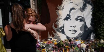 Dolly Parton, Gloria Steinem, and Why Grieving a Celebrity Feels So Personal