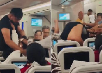 Plane passengers trade blows in wild mid-flight brawl in front of terrified kids