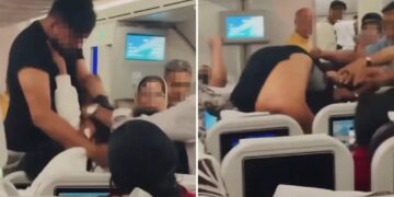 Plane passengers trade blows in wild mid-flight brawl in front of terrified kids