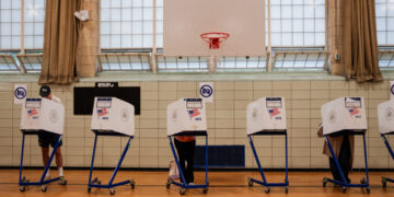 Civil Rights Groups Sue to Keep Armed Agents Away From Voting Sites