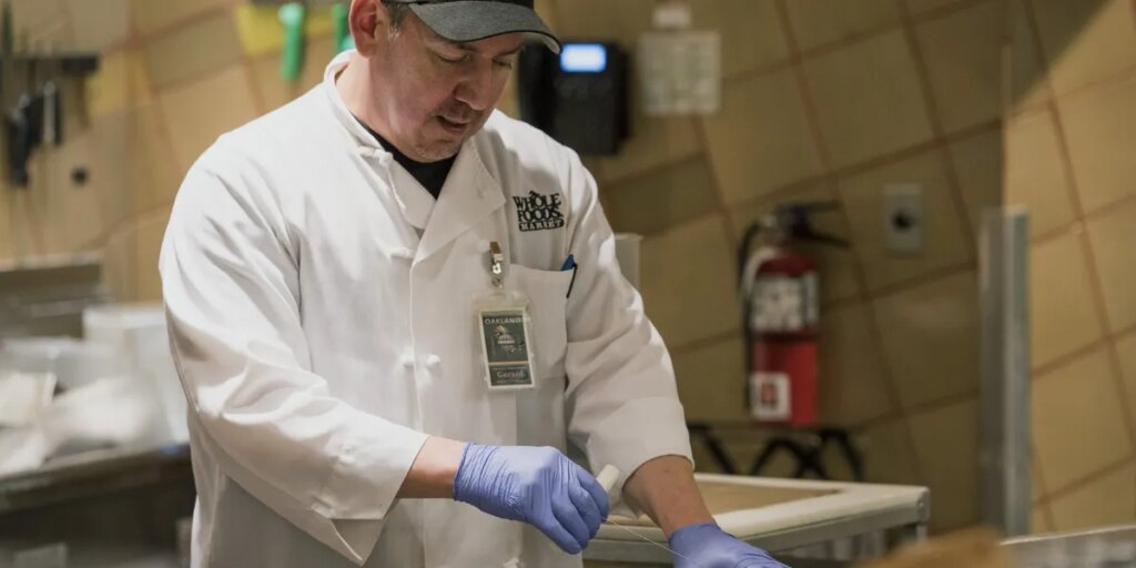Amazon is investing $230 million in higher pay, benefits, and college perks for more than 100,000 Whole Foods workers—bumping up hourly pay to $21