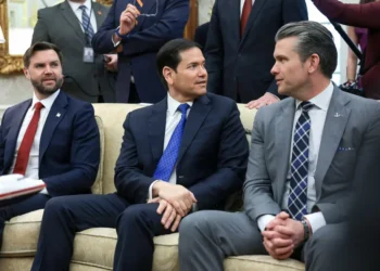‘Tell me if it’s real’: White House bigwig accused of perfecting his look with ‘paste’