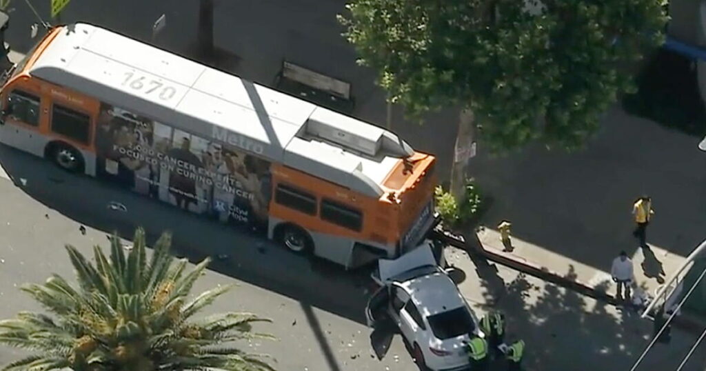 Six taken to the hospital after car crashes into Metro bus in Reseda