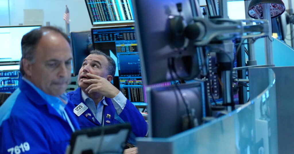 Wall Street drifts lower as bond yields rise and oil prices swing