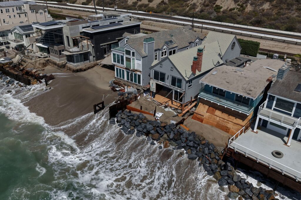 Fight intensifies over the fate of homes falling into the sea