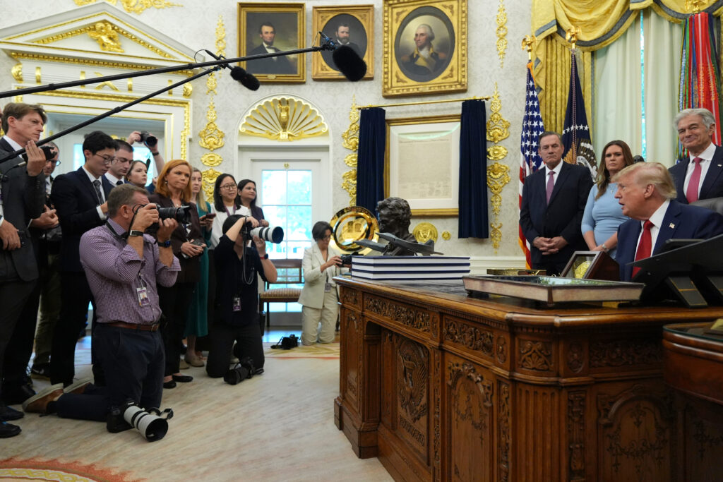 Trump says he will demand drug companies split up vaccines into more doses