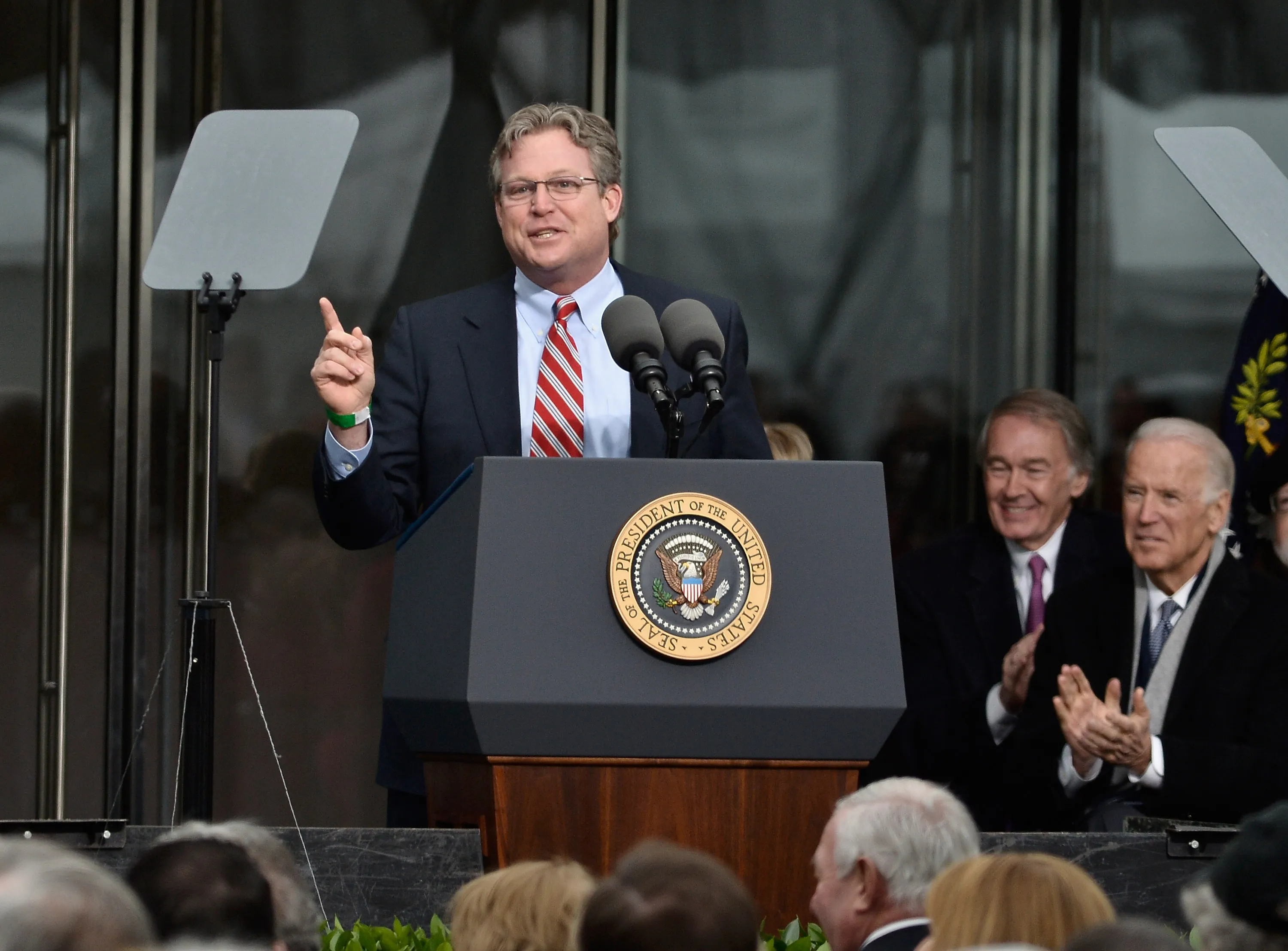 Connecticut Senator Edward M. Kennedy Jr. speaking at a podium with the Seal of the President of the United States.