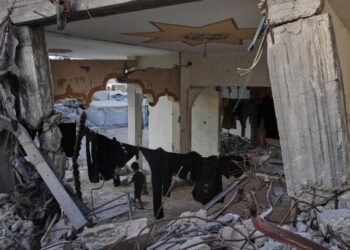 Fatal building collapse highlights dangers plaguing Gaza nearly a year after ceasefire