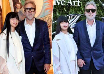 Barely recognizable Nicolas Cage, 62, sports gray beard in rare red carpet appearance with much-younger wife Riko Shibata, 31
