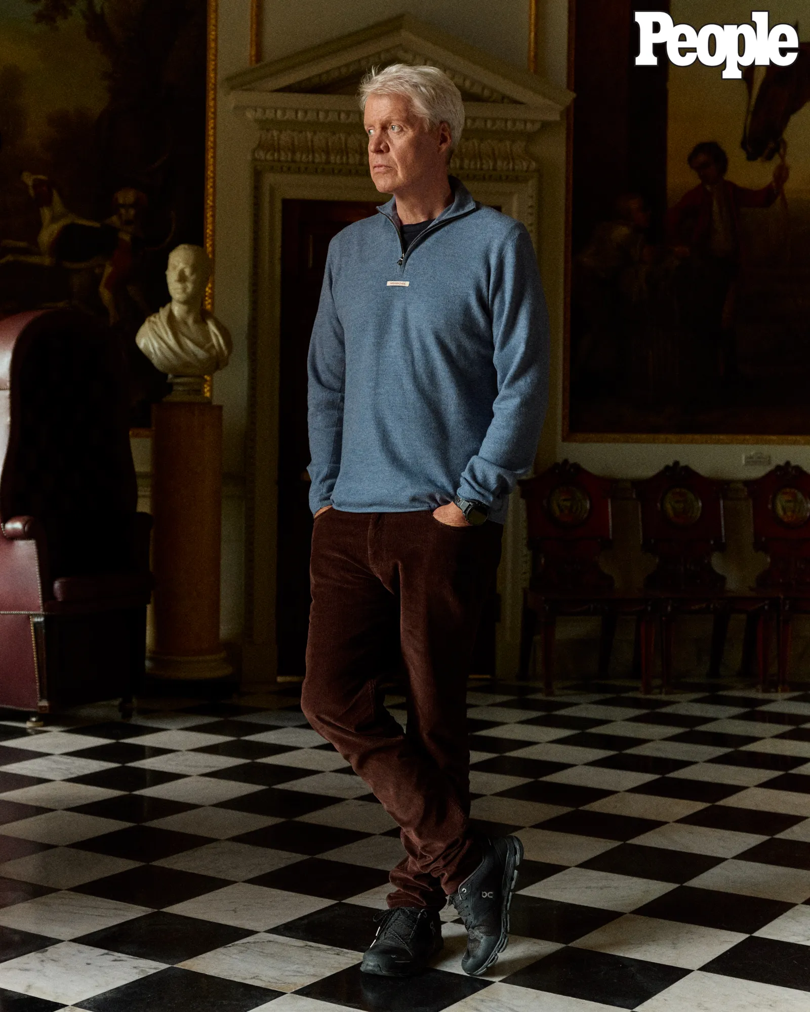 Charles Spencer posing for People magazine.