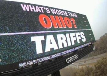 Swing-state billboards use football trash talk to call foul on tariffs