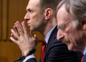 Fed official warns persistent inflation could require more rate hikes — and economic pain
