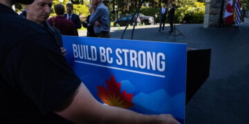 British Columbia leader calls snap election as premier tells voters to say ‘hell no to Trump’