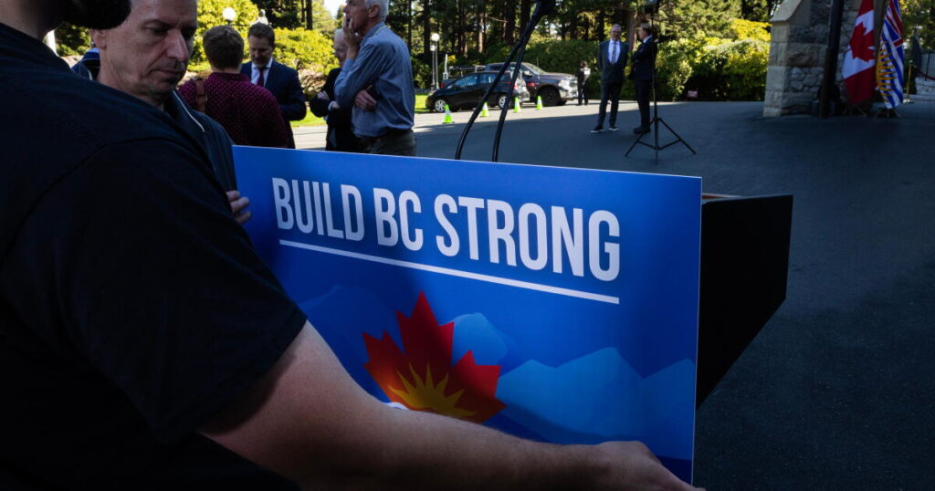 British Columbia leader calls snap election as premier tells voters to say ‘hell no to Trump’