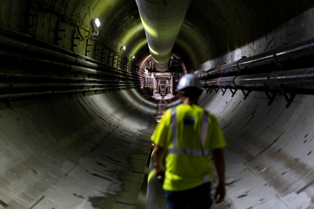 A photographer descends into a massive tunnel meant to protect the Potomac