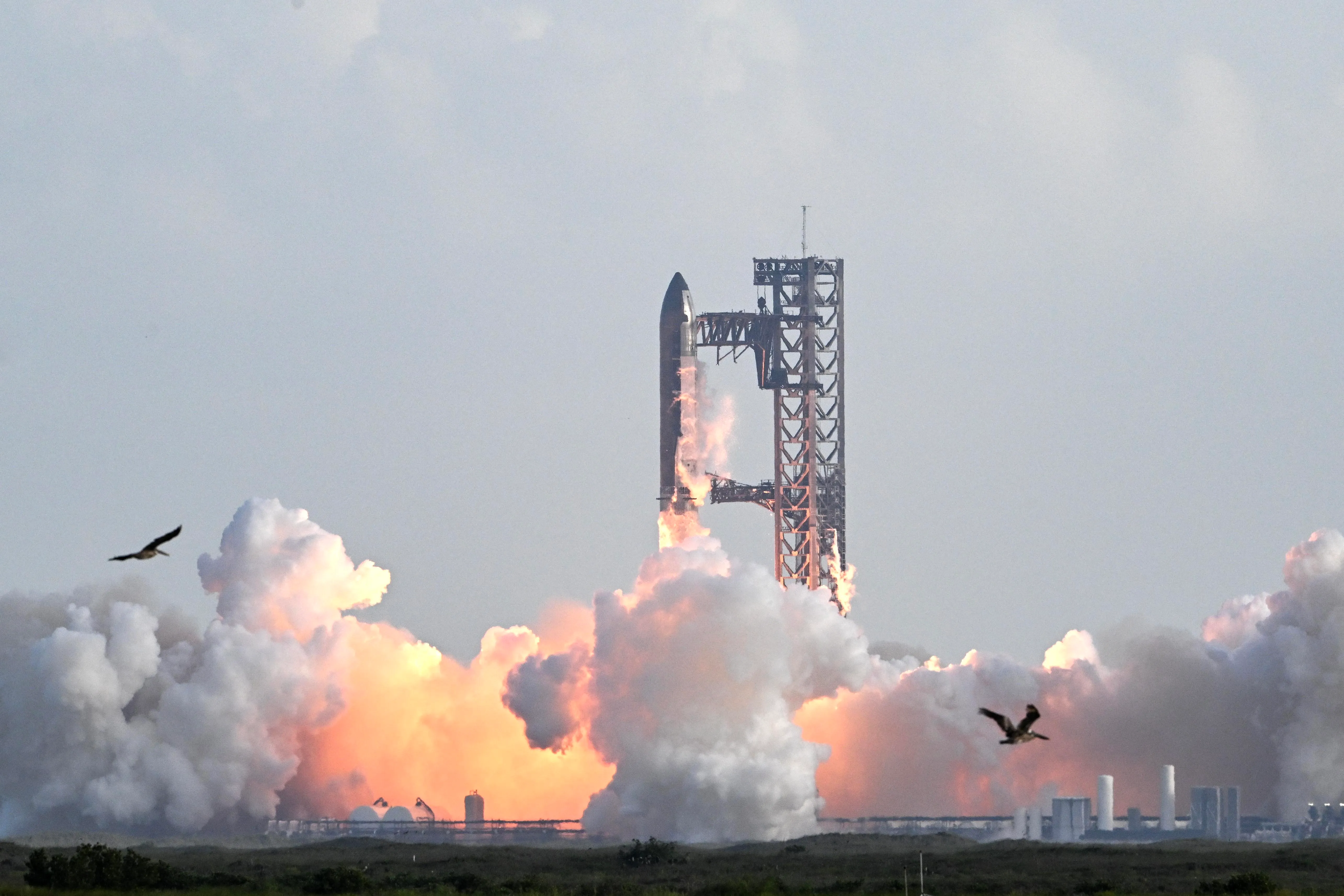 SpaceX's Starship rocket lifts off from Starbase, Texas, as seen from South Padre Island on August 26, 2025, for its tenth test flight SpaceX's Starship rocket lifts off from Starbase, Texas, as seen from South Padre Island on August 26, 2025, for its tenth test flight