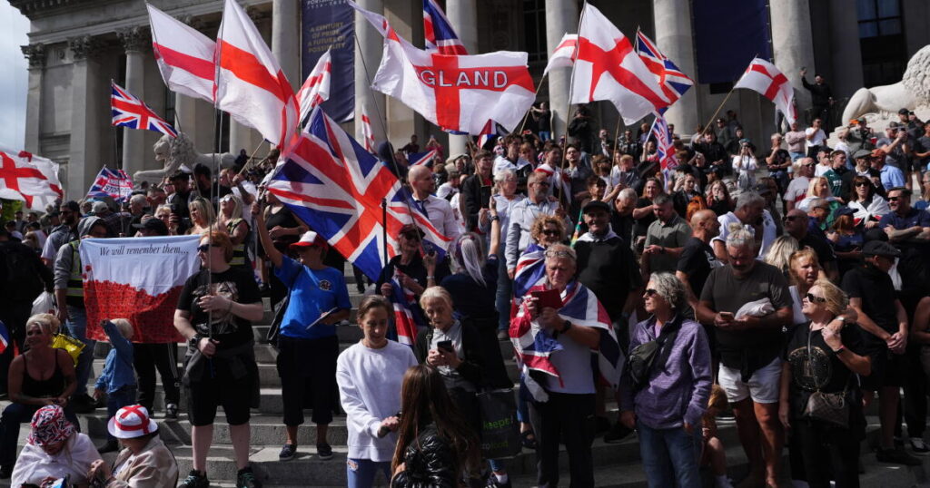 Far-right U.K. activist charged after migrant dinghy slashed in the English Channel