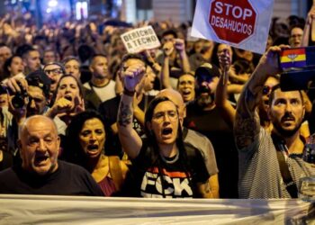 An 87-year-old woman was evicted via stretcher from a Madrid apartment she lived in for decades, sparking mass protest against Spain’s housing crisis