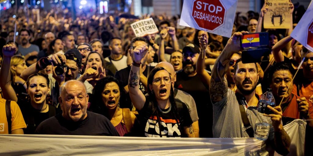 An 87-year-old woman was evicted via stretcher from a Madrid apartment she lived in for decades, sparking mass protest against Spain’s housing crisis