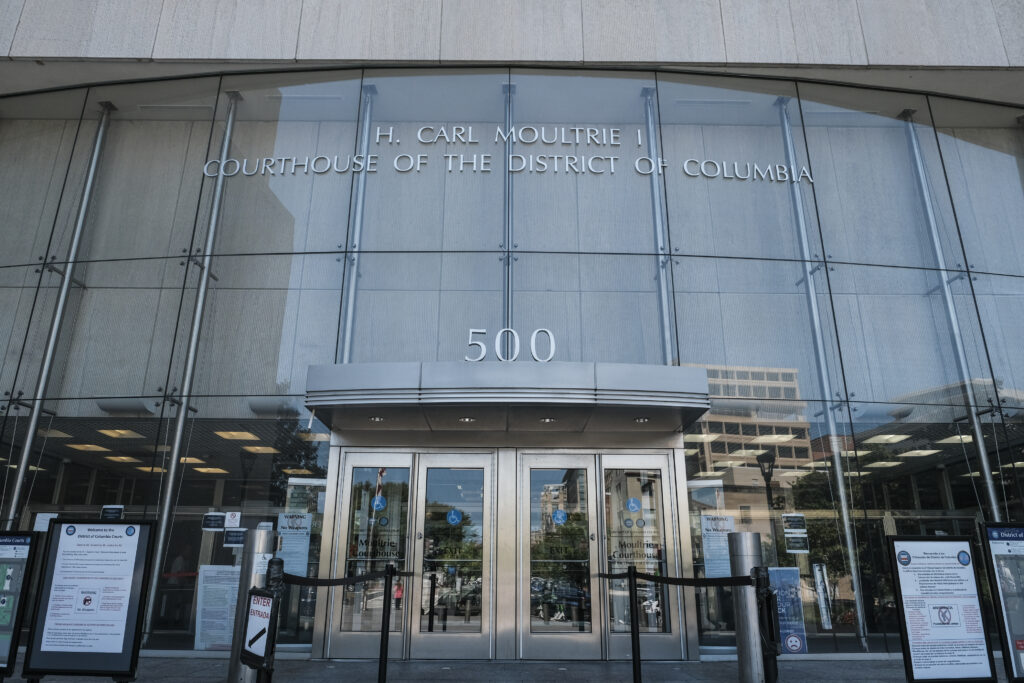 She was arrested by D.C. police. Her twin was the actual suspect, a lawsuit says.