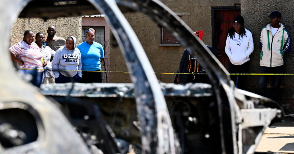 Police hunt gunmen after 2 mass shootings in South Africa leave at least 27 dead