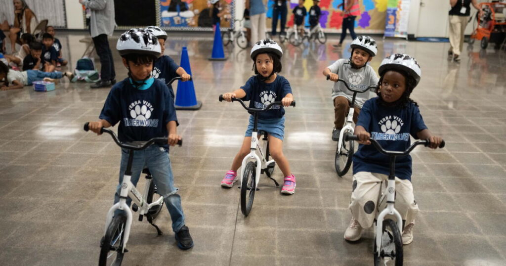 Schools are teaching kindergartners how to ride a bike in gym class