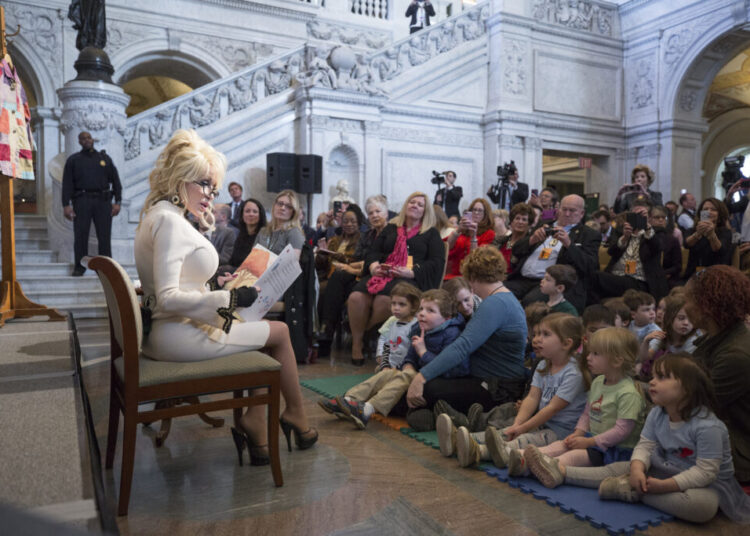 Dolly Parton’s free book program for children is expanding after her death