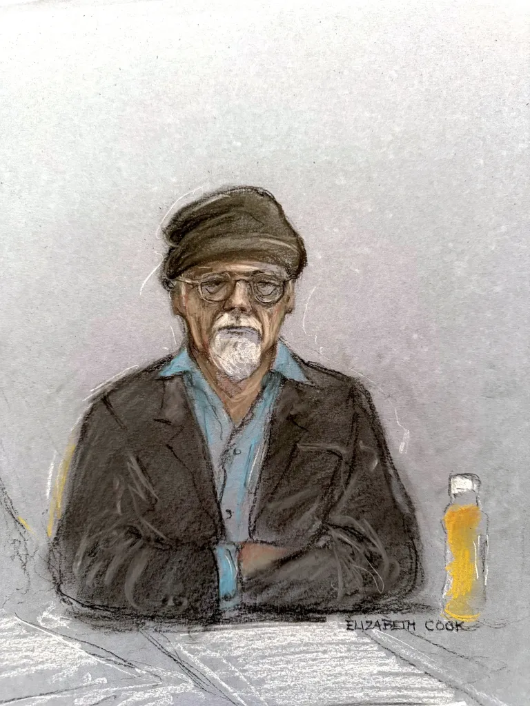 Illustration of Gary Glitter in court, wearing a dark cap, glasses, and a light blue shirt under a dark jacket, with a bottle to his right.