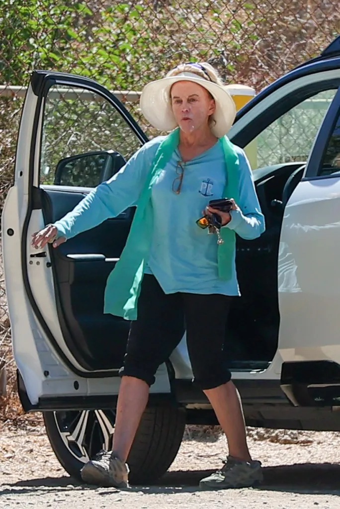 Linda Purl exiting a car after a solo hike.