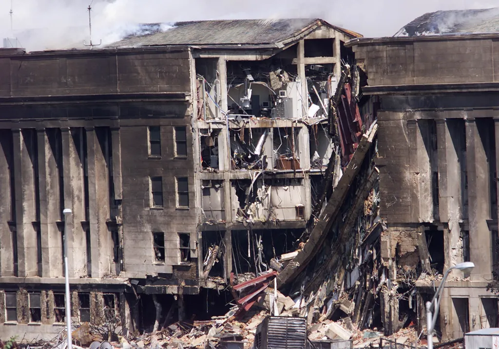 Smoke billows from the Pentagon after a hijacked airplane crashed into the facility on Tuesday, September 11, 2001, in Washington, DC. The September 11, 2001, attacks killed nearly 3,000 people in New York, Washington and Pennsylvania.