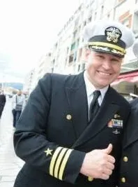 Christian Bradley Williams in a navy uniform.