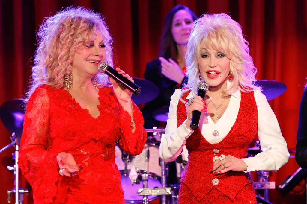 Stella Parton and Dolly Parton performing on stage.