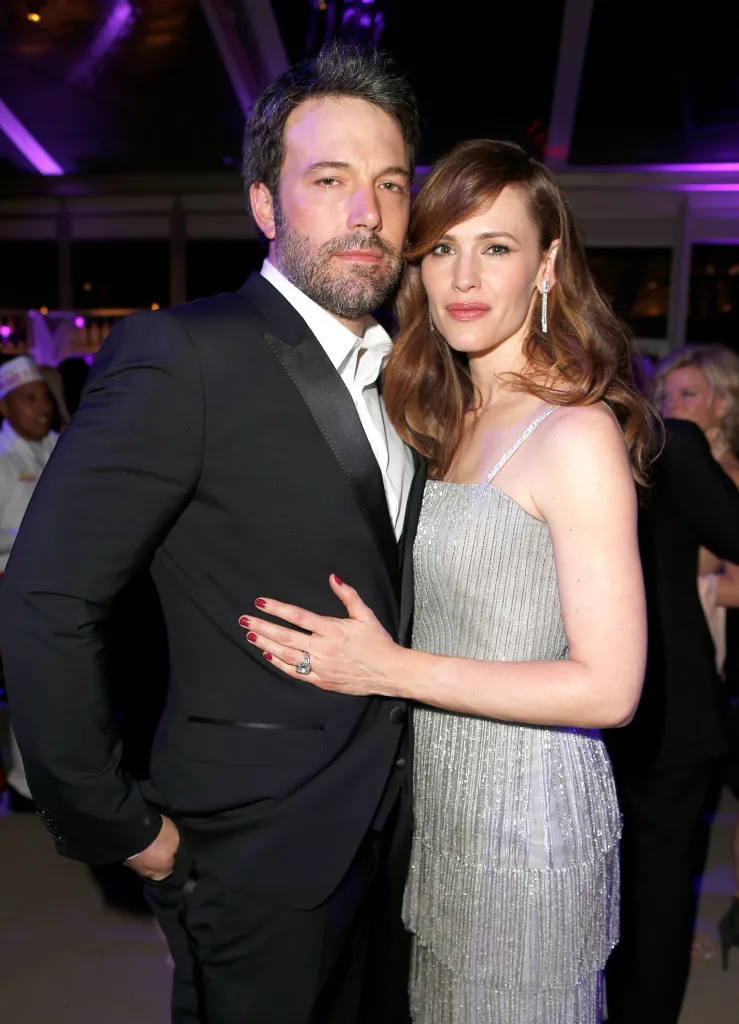 Ben Affleck and Jennifer Garner pose together at the 2014 Vanity Fair Oscar Party.