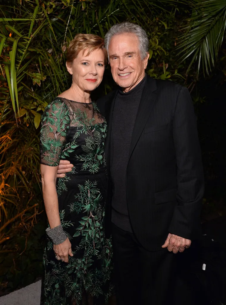 Actors Annette Bening and Warren Beatty posing together at an event.