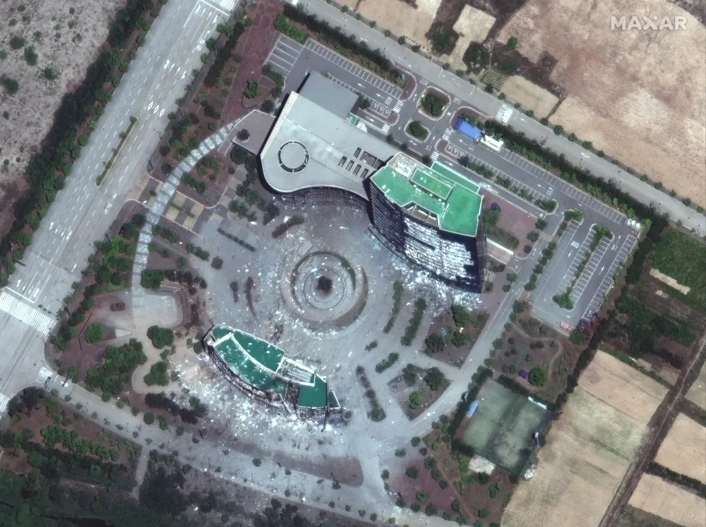 A handout satellite image shows a close-up view of the north-south joint liaison office and administration building on June 22, 2020, after it was intentionally destroyed by explosives set by North Korean forces.