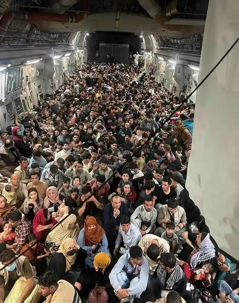 A US Air Force Boeing C-17 Globemaster III transports Afghan citizens from Hamid Karzai International Airport, on Aug. 15, 2021.