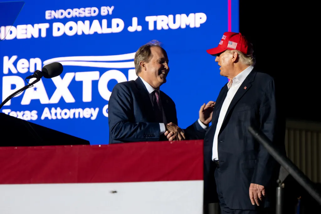 President Donald Trump with Texas Attorney General Ken Paxton as the president-linked super PAC put $10 million in ad spending for Paxton's senate race.