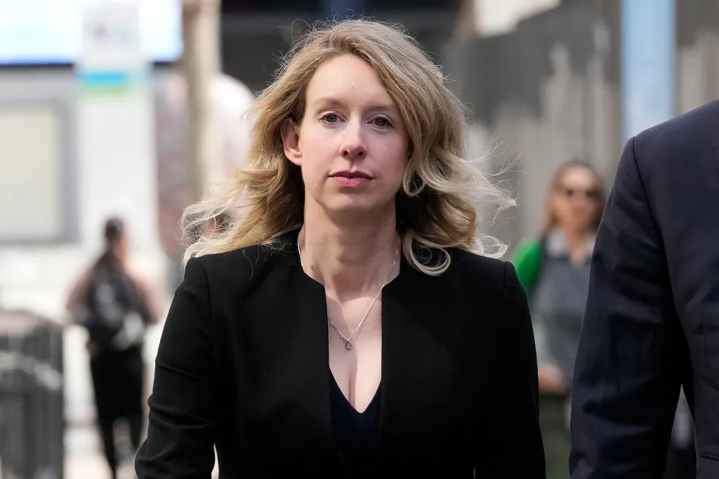 Elizabeth Holmes, former Theranos CEO, walking outside federal court in San Jose, Calif.