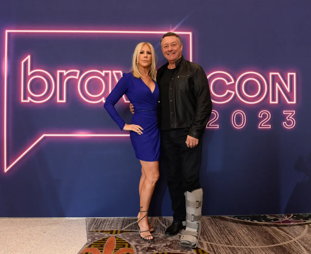 Vicki Gunvalson and Michael Smith smiling at BravoCon 2023.
