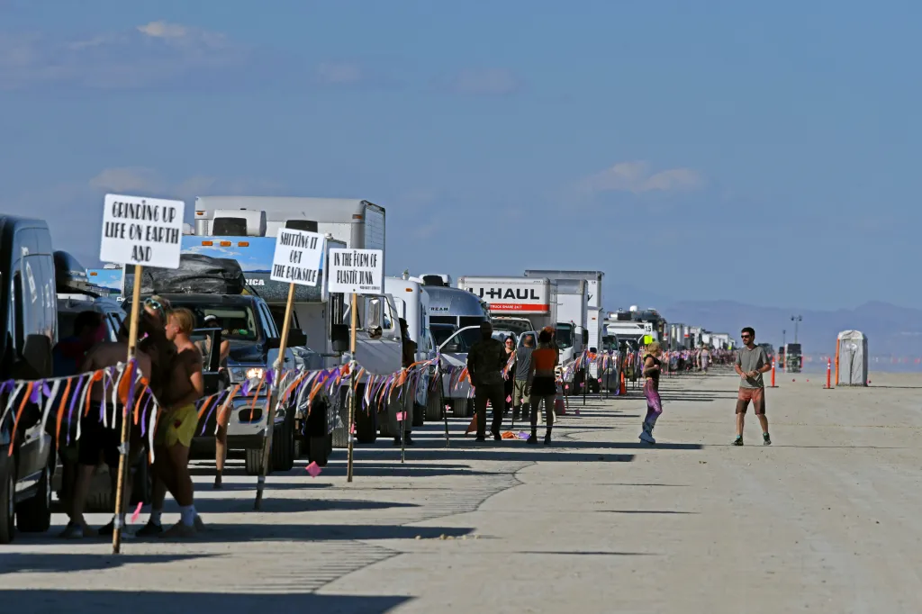 Stranded festivalgoers waiting for traffic to move so they can leave the event.