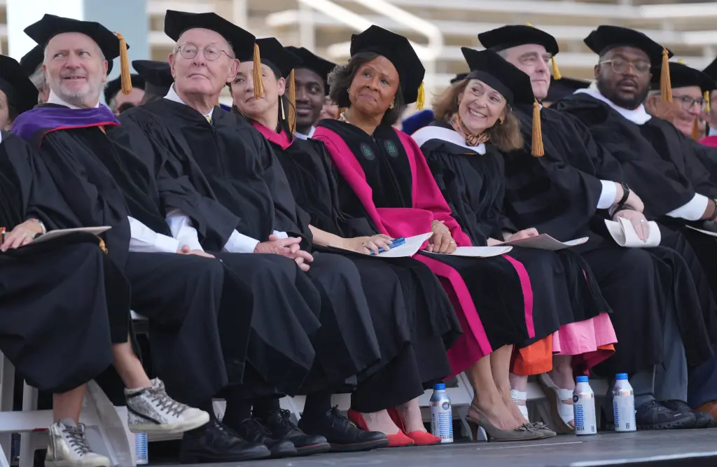 A group of faculty and honorary degree recipients sitting in graduation gowns at Princeton University's 277th Commencement.
