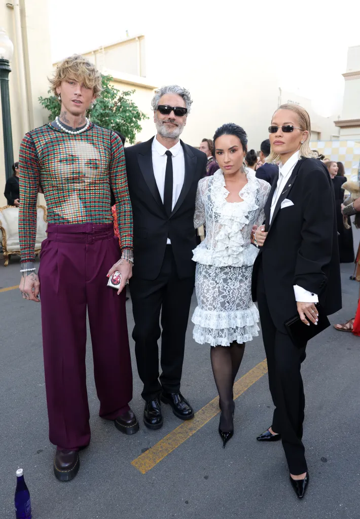 mgk, Taika Waititi, Demi Lovato, and Rita Ora pose at Vogue World: Hollywood 2025.