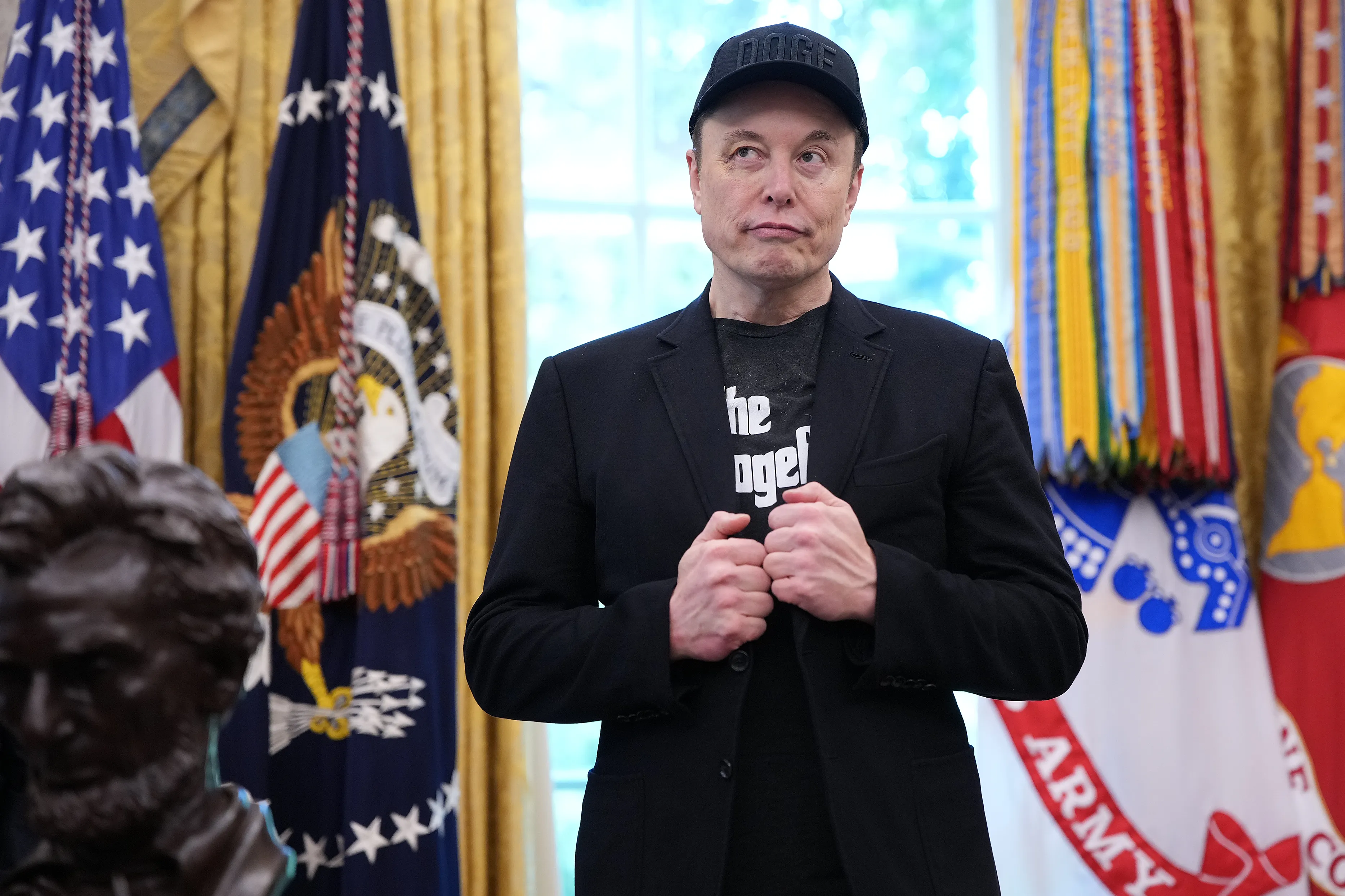 Elon Musk in a black 