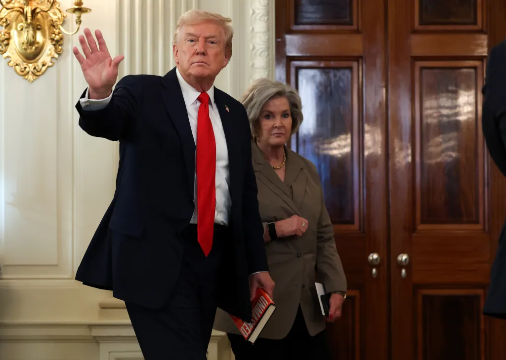 President Trump departs with Wiles following a roundtable discussion in the State Dining Room of the White House in Washington on Oct. 8, 2025.