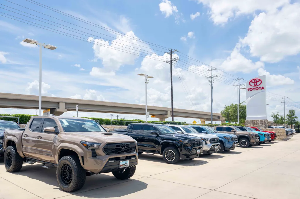 Toyota Tacomas displayed for sale at the Toyota Cedar Park dealership.