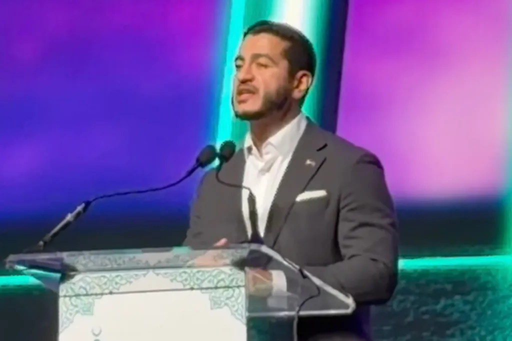 Abdul El-Sayed speaking at a podium.