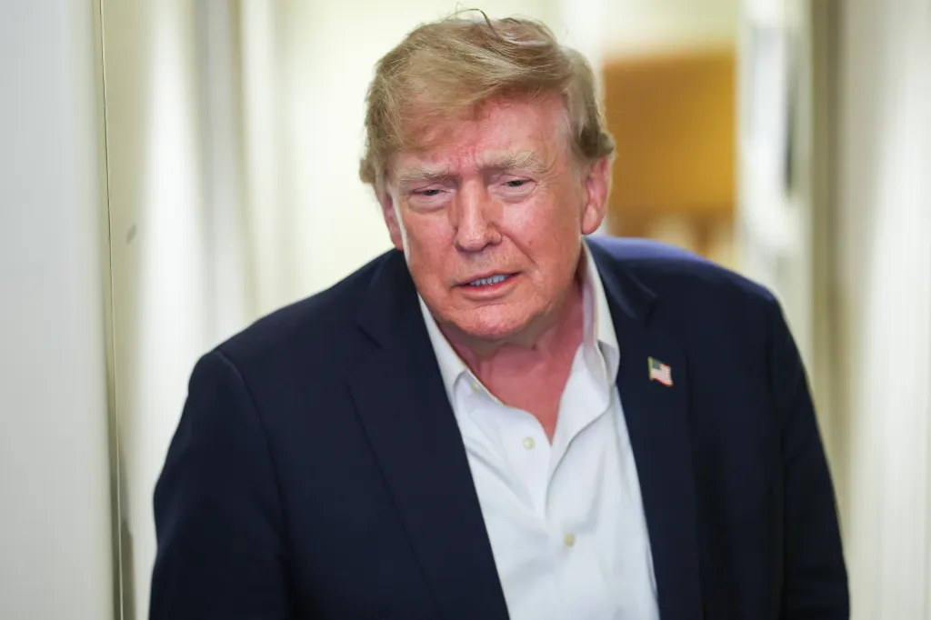 President Donald Trump speaking to reporters aboard Air Force One.