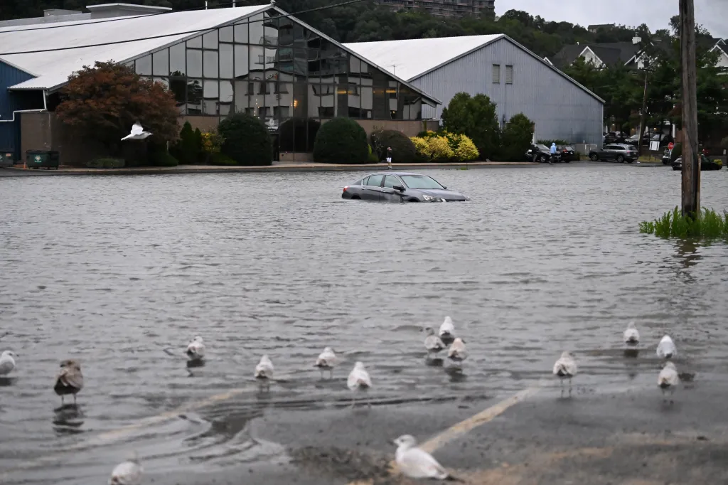 A vehicle is seen submerged in flood waters in the parking lot of the Comfort Inn Edgewater on Hudson River during a nor'easter storm in Edgewater, New Jersey, on Sept. 26, 2026.