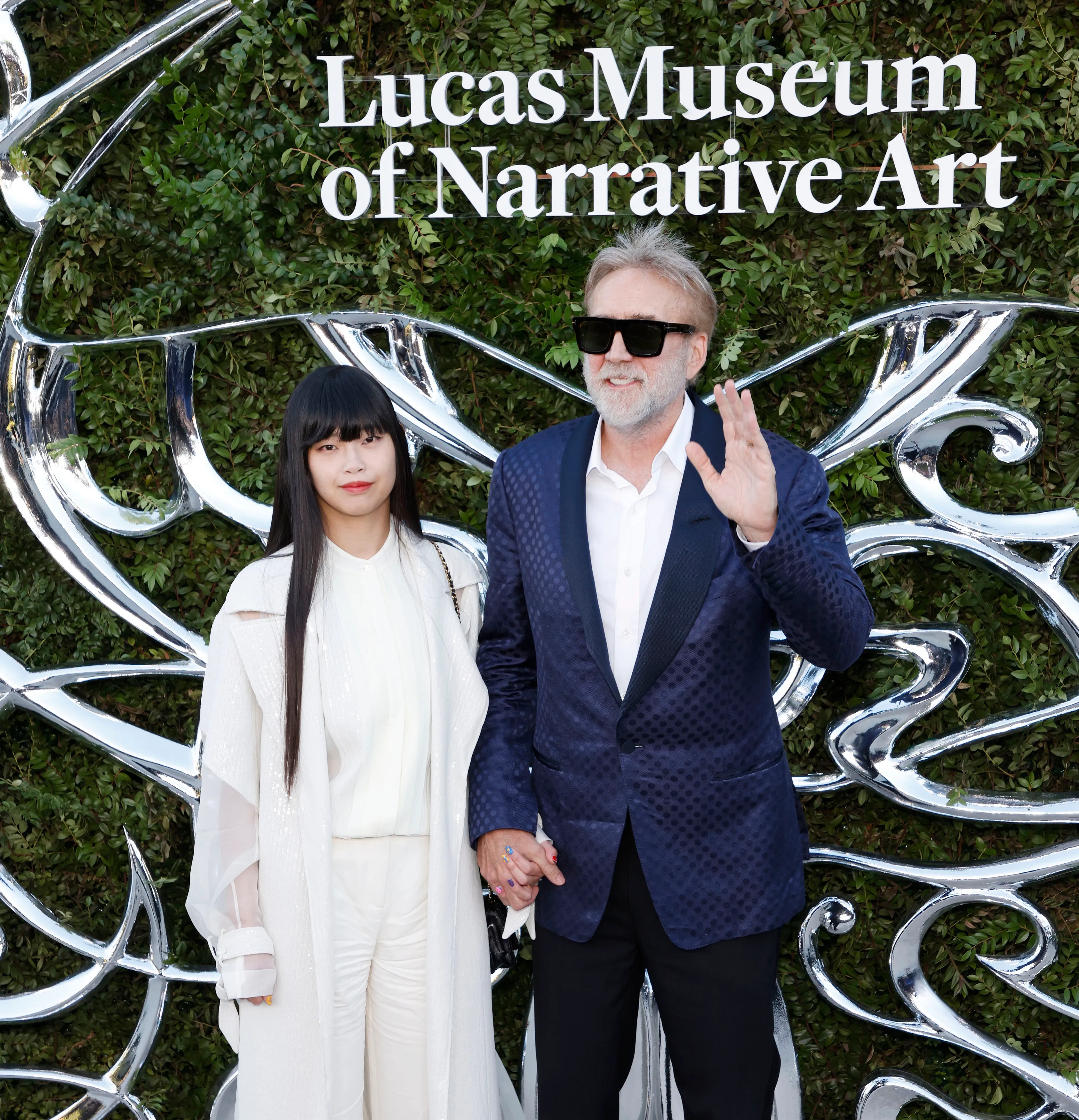 Riko Shibata and Nicolas Cage at the Lucas Museum of Narrative Art opening night.